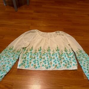 Free People embroidered crop top. Size M